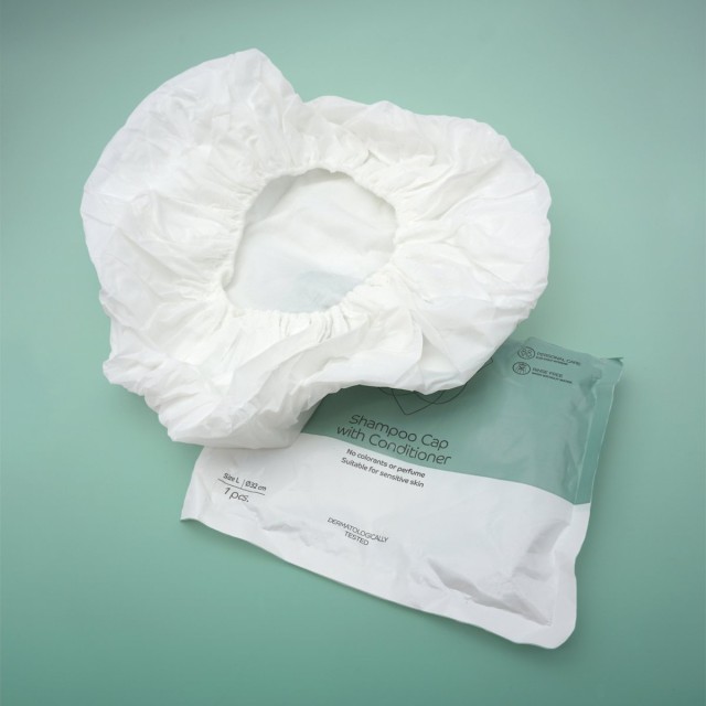 Abena Shampoo Cap With Conditioner Σκούφος λουσίματος Ασθενών 32cm, 1τμχ